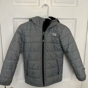 Kids size small 7/8 reversible North Face Jacket